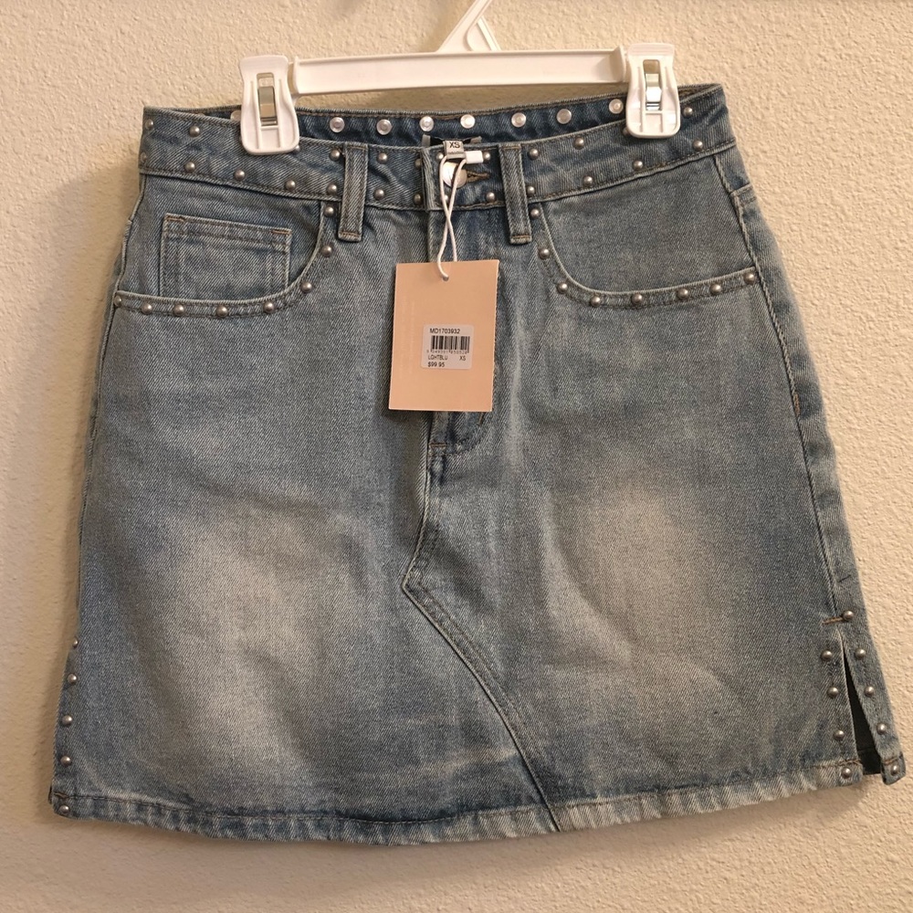Light blue studded denim mini skirt